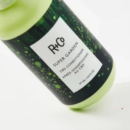 Bottle of Super Garden conditioner y R+Co
