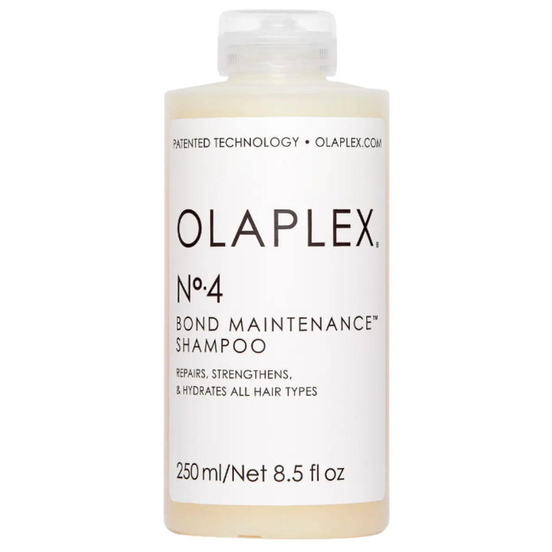 A bottle of Olaplex No.4 Bond Maintenance Shampoo, which is designed for hair repair and protection.