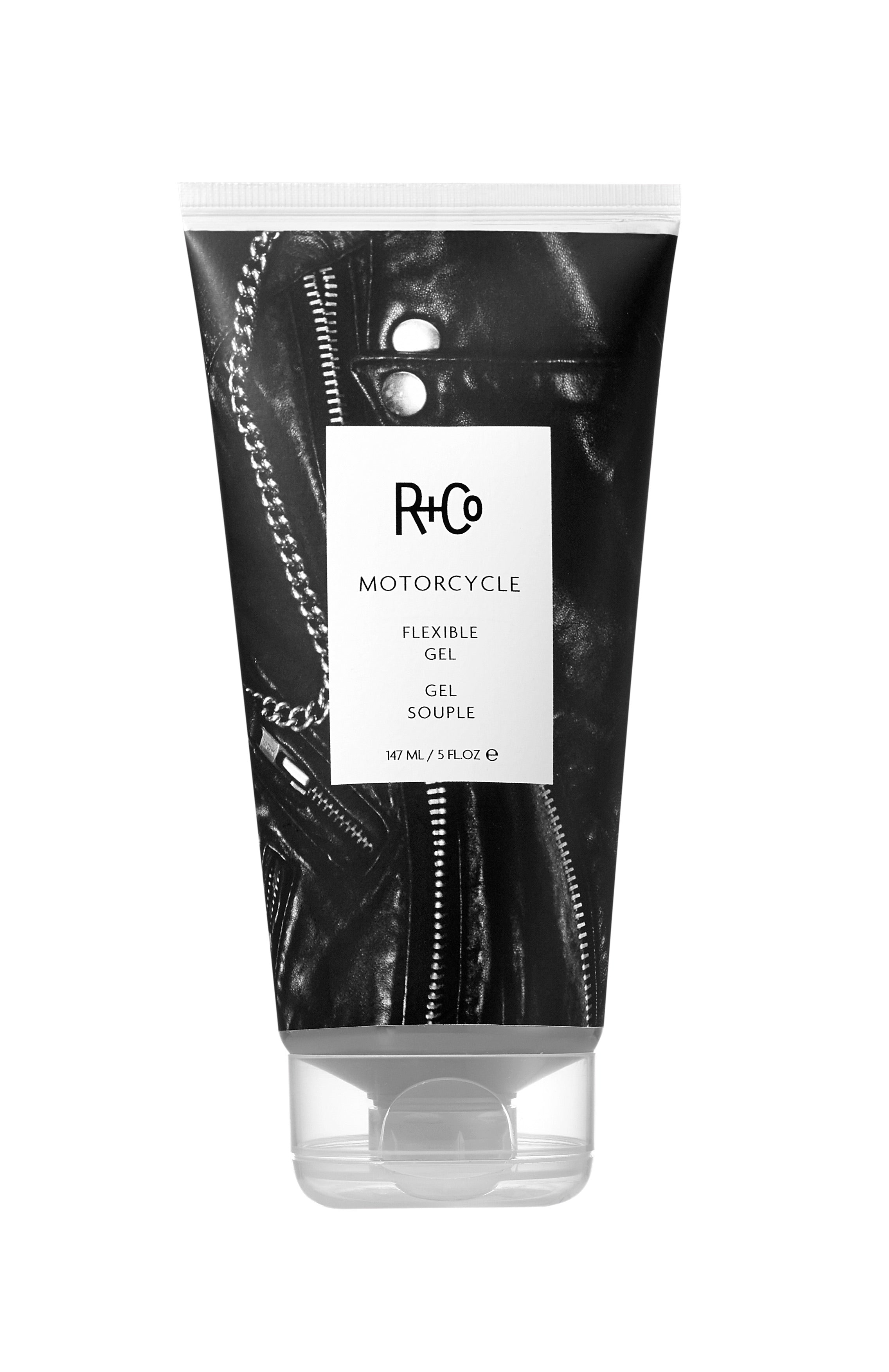 A tube of 'R+Co Motorcycle Flexible Gel' with a black leather design on the packaging.