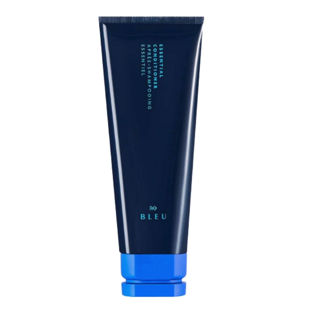 Blue container of R+Co Bleu Essential Conditioner hair product with light blue cap
