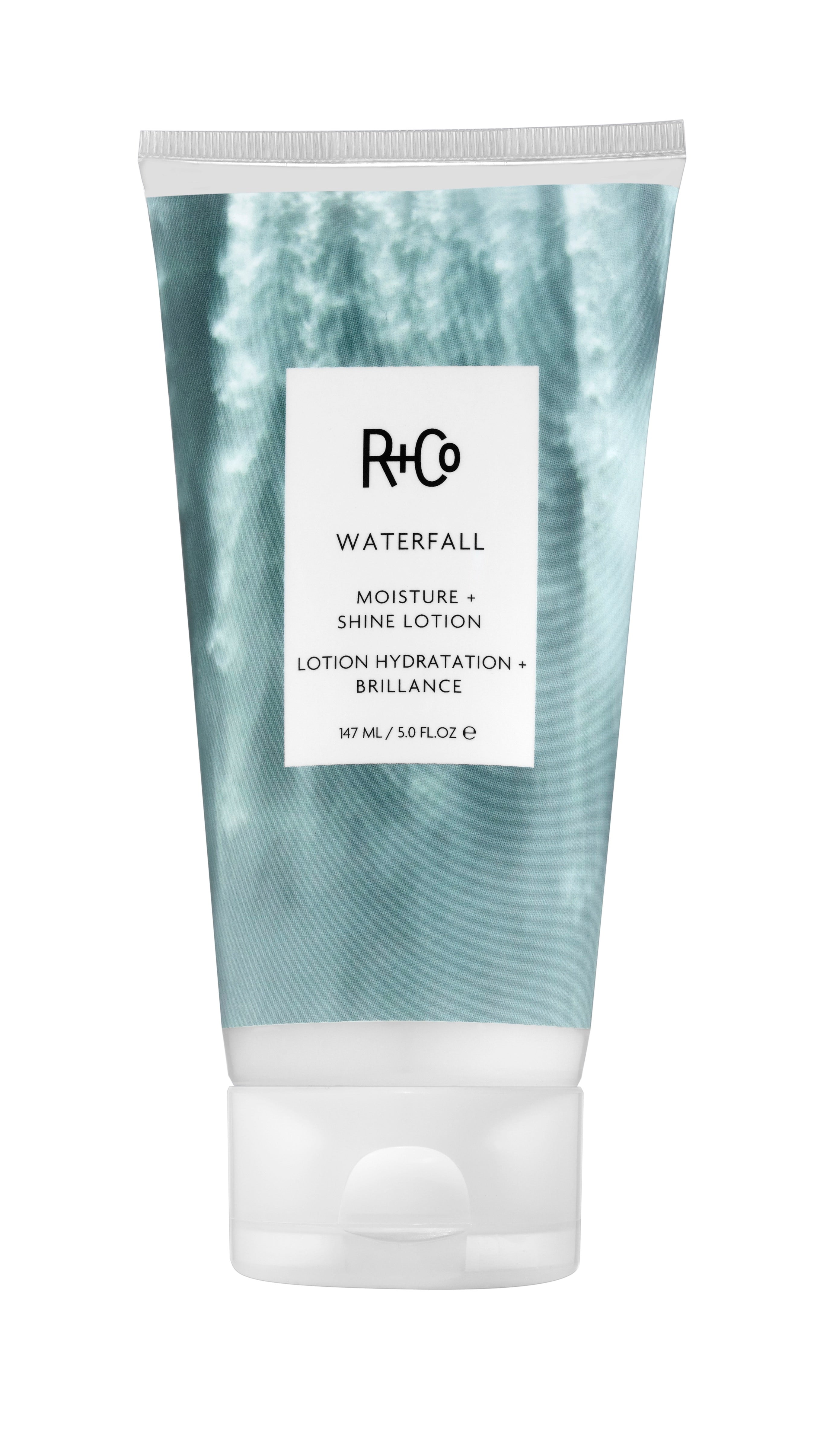 Tube of R+Co Waterfall Moisture + Shine Lotion with waterfall image on the label