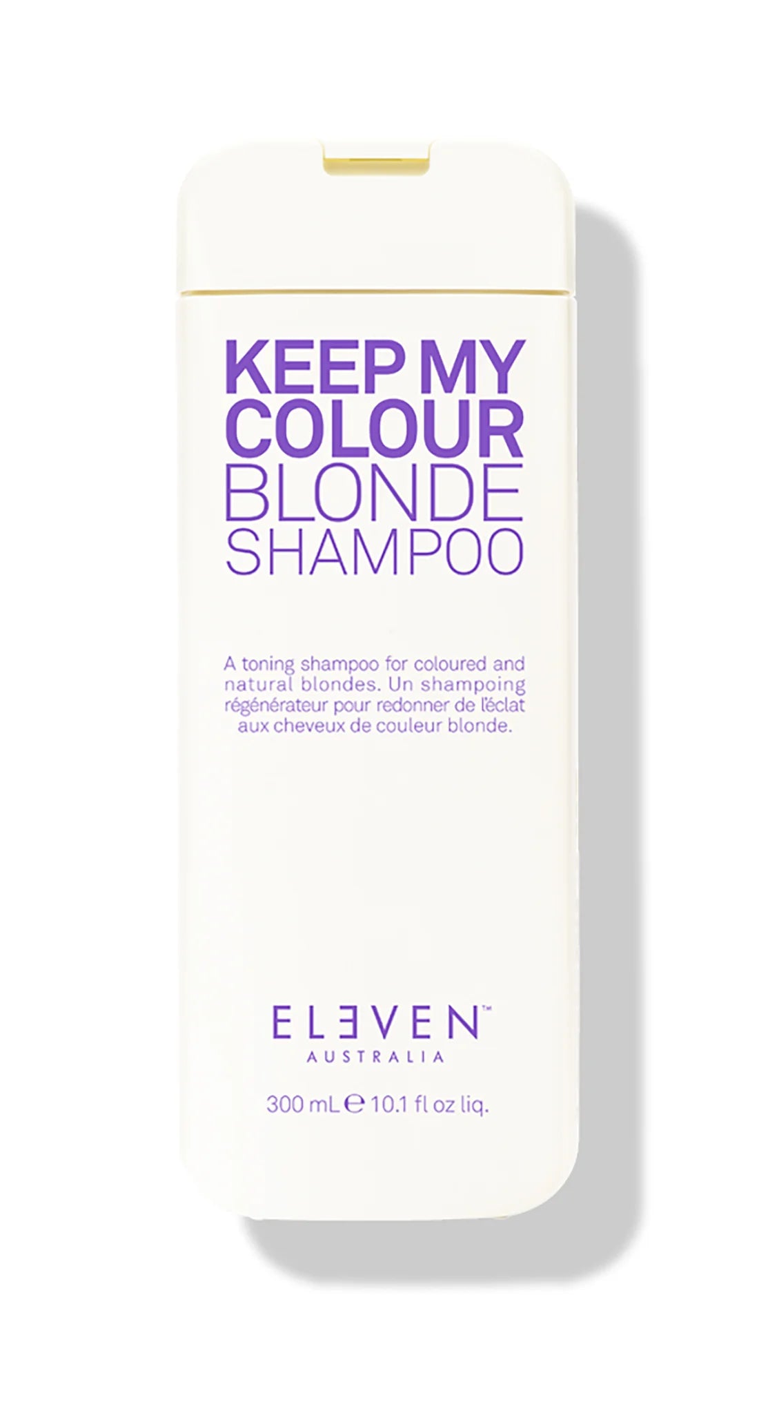 A bottle of 'Keep My Colour Blonde Shampoo' by ELEVEN with a white and purple label, indicating it is a shampoo specifically formulated for blonde hair.