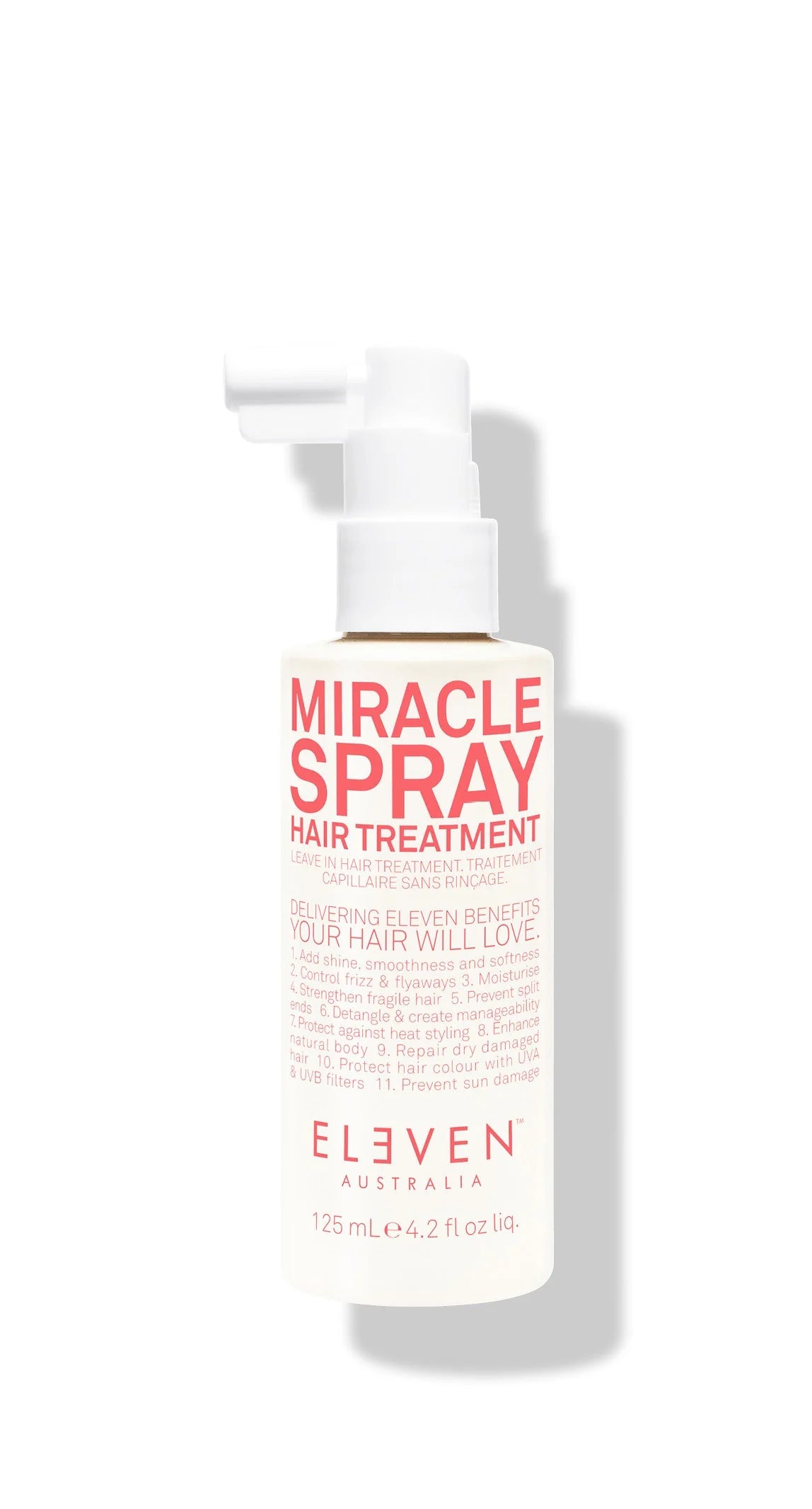 Bottle of MIRACLE SPRAY HAIR TREATMENT by Eleven, a leave-in hair treatment with a white pump dispenser, labeled with the product name and benefits.