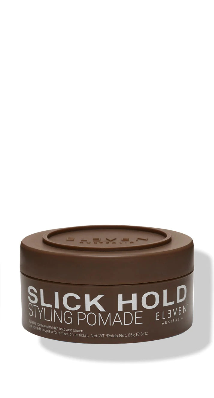 Brown container of Slick Hold Styling Pomade by ELEVEN.