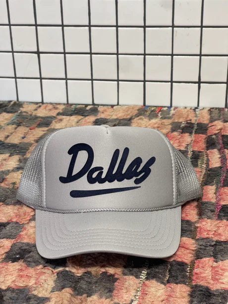 Grey trucker hat with black 'Dallas' text on the front
