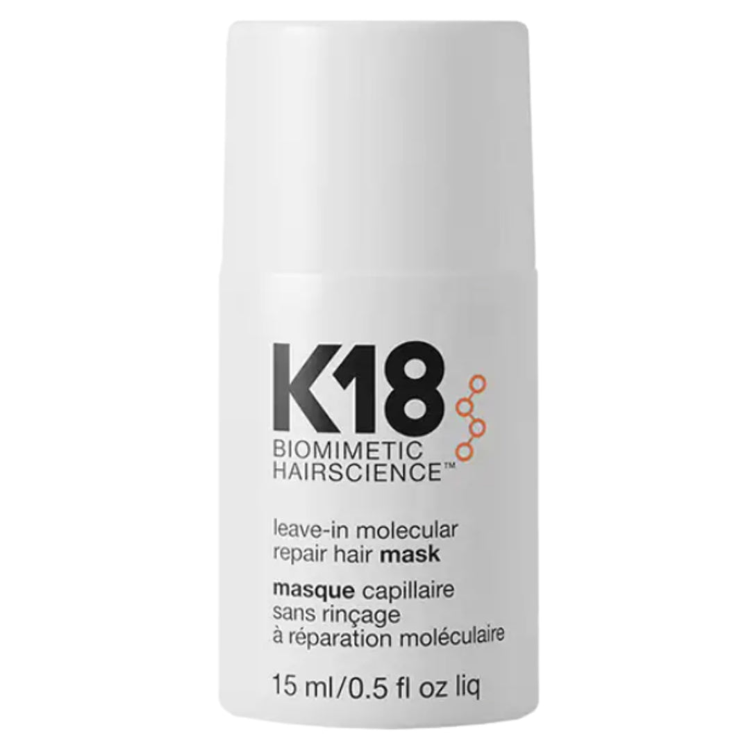 A bottle of K18 Biomimetic Hairscience Leave-in Molecular Repair Hair Mask, with text detailing product use and benefits.