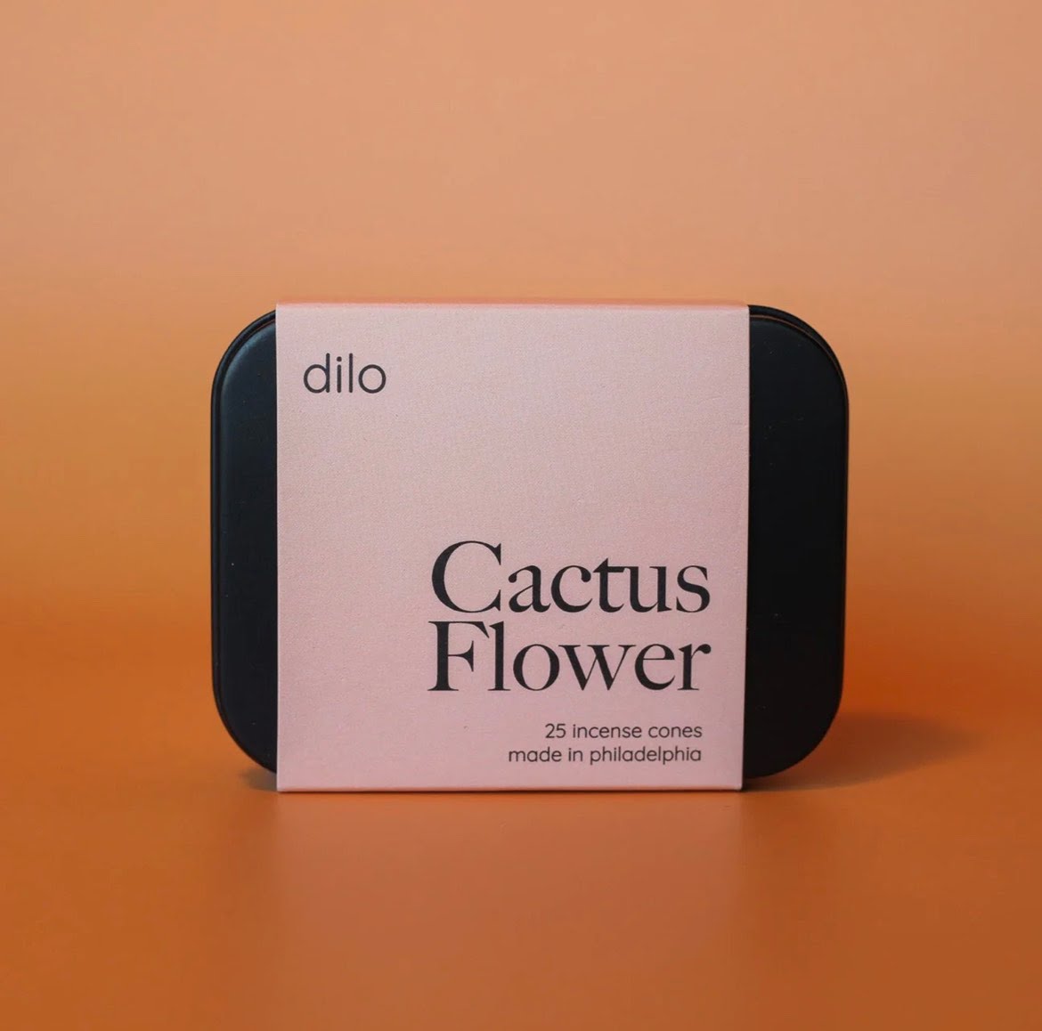 Black tin of Dilo brand Cactus Flower incense cones in light color retail wrapper