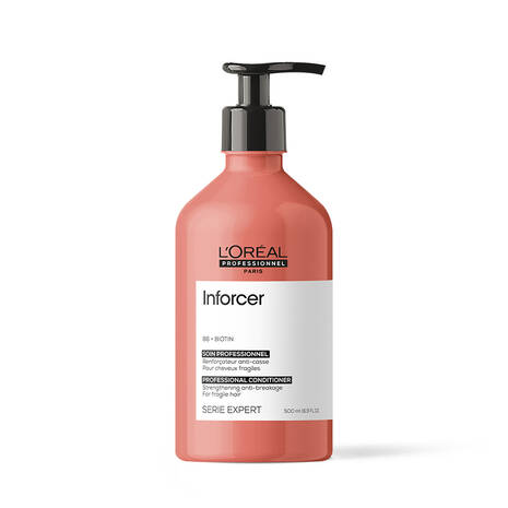 Peach bottle of L'Oréal Professionnel Inforcer biotin professional conditioner