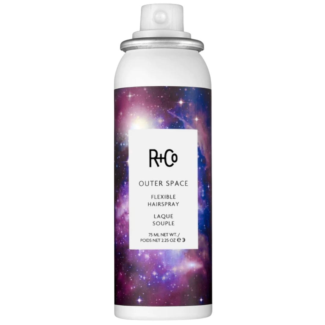 White can of R+Co Outer Space Flexible Hairspray with a starry space image on the label