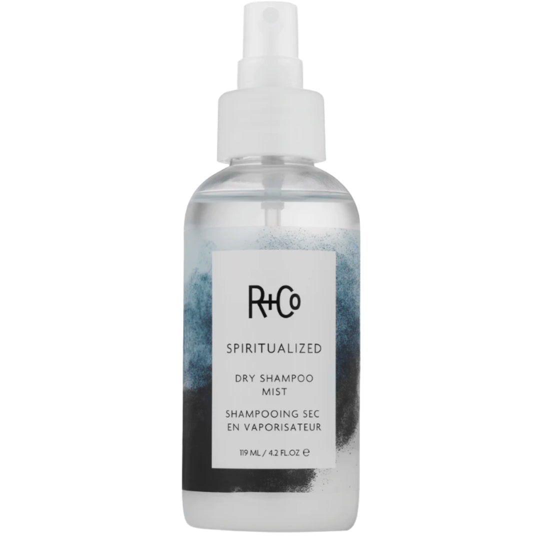 Spray bottle of R+Co Spiritualized Dry Shampoo Mist hair product