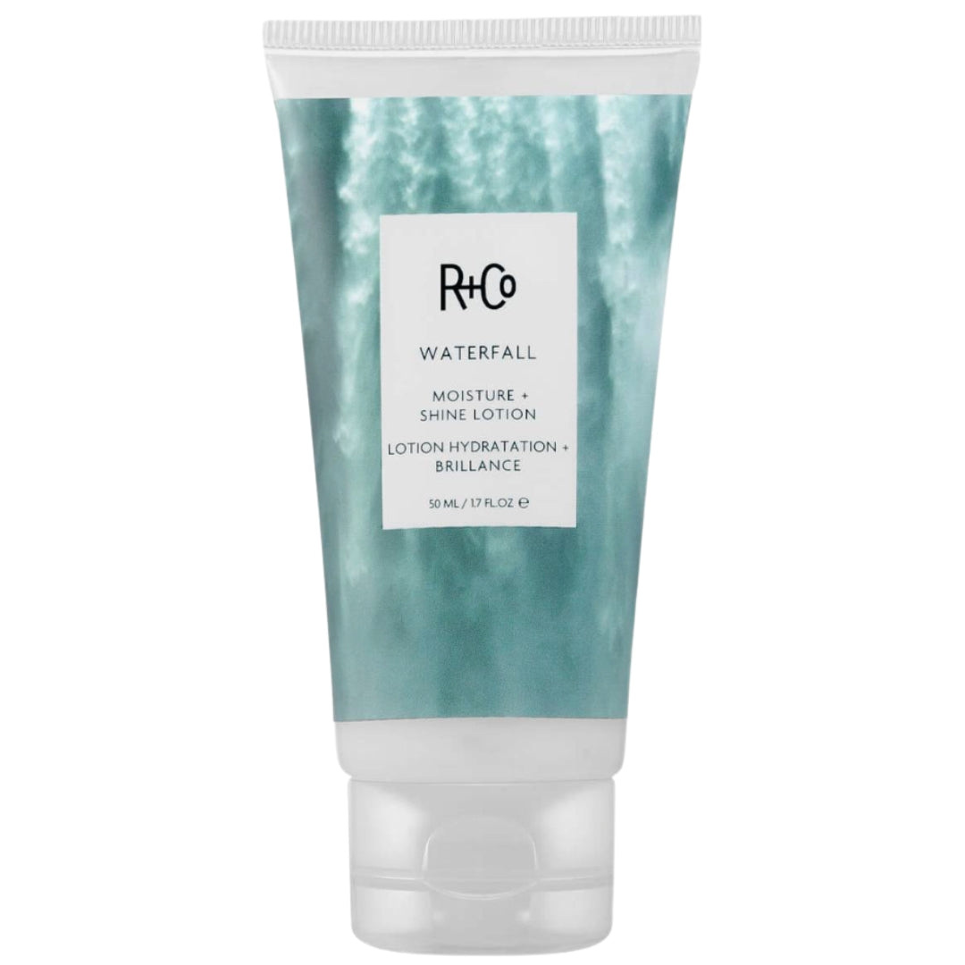 White tube of R+Co Waterfall Moisture and Shine Lotion with waterfall image on label