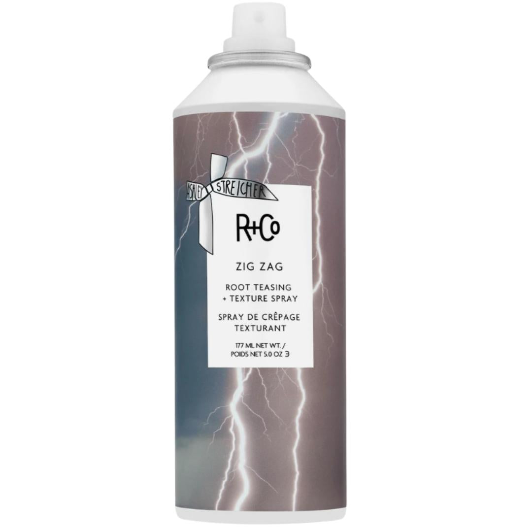 White can of R+Co Zig Zag Root Teasing and Texture Spray with lightning bolts on label