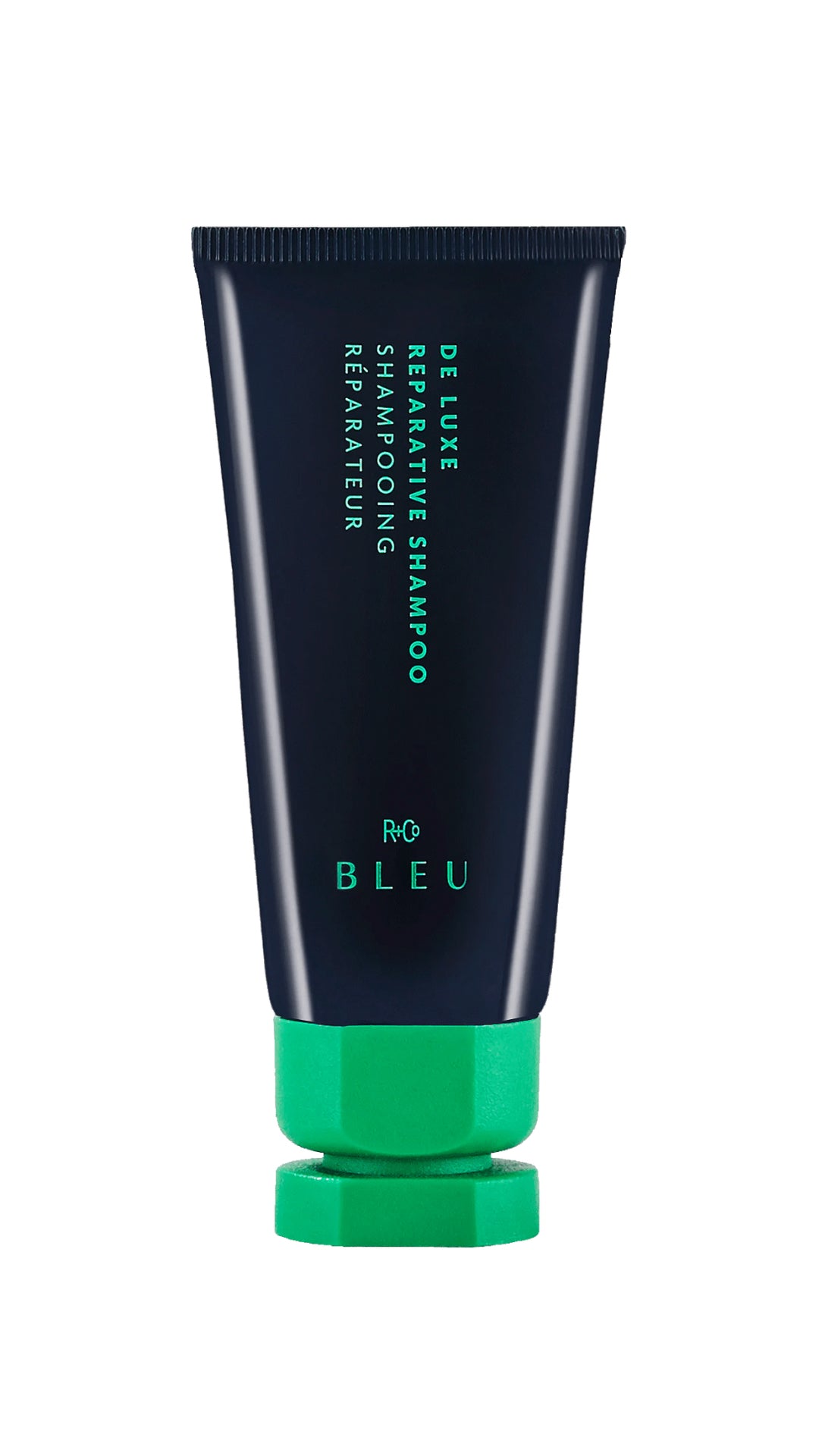 Dark blue tube with green cap; R+Co Bleu De Luxe Reparative Shampoo