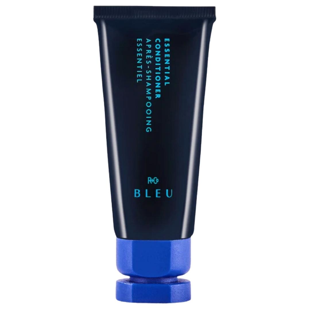 Blue container of R+Co Bleu Essential Conditioner hair product with light blue cap
