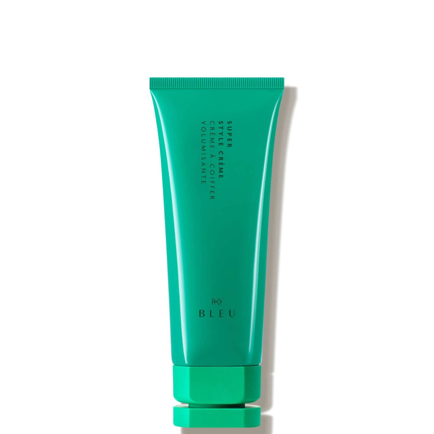 A green tube of 'Super Style Crème' hair product by R+Co Bleu